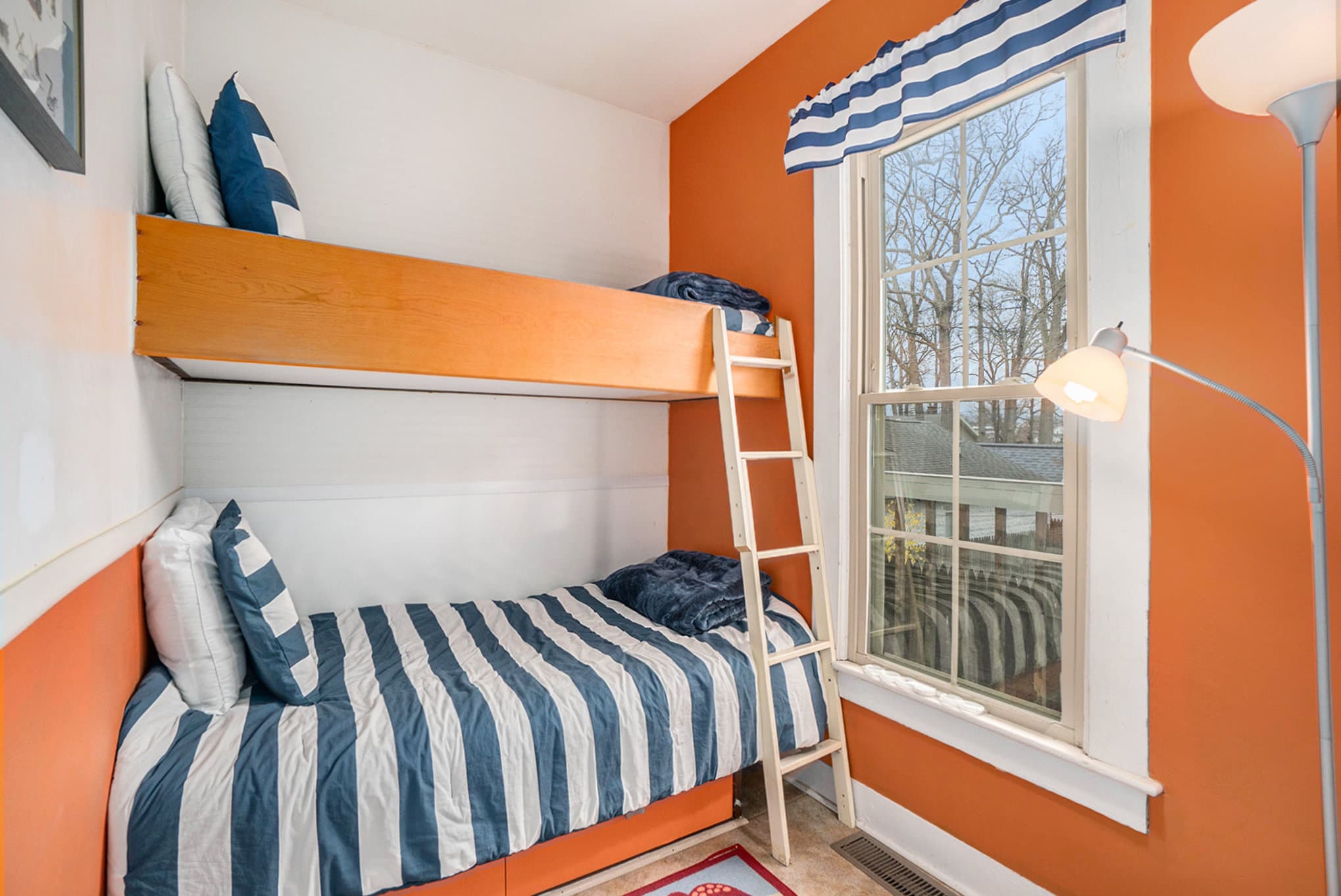 room with two twin bunks