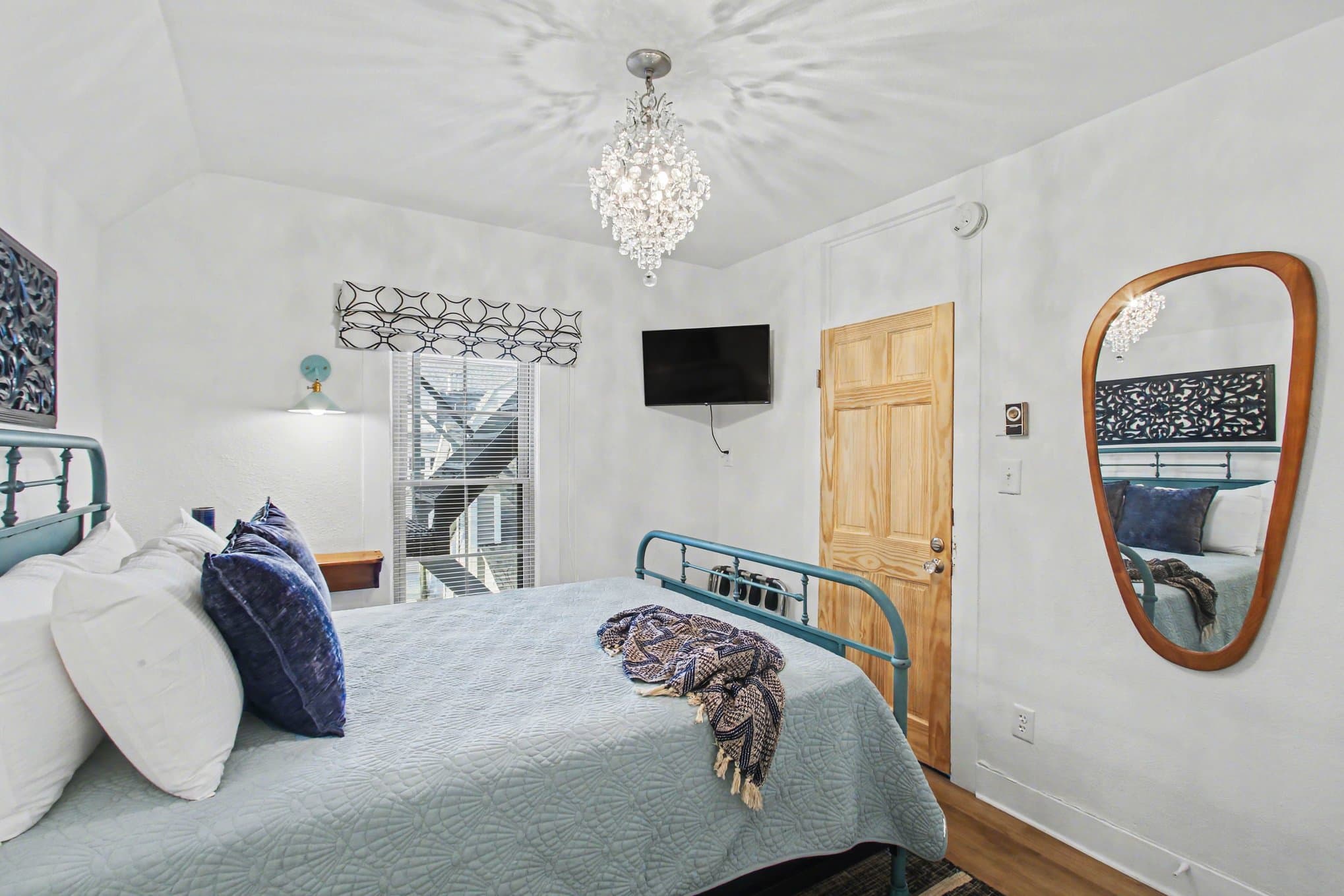 queen bed and bathroom