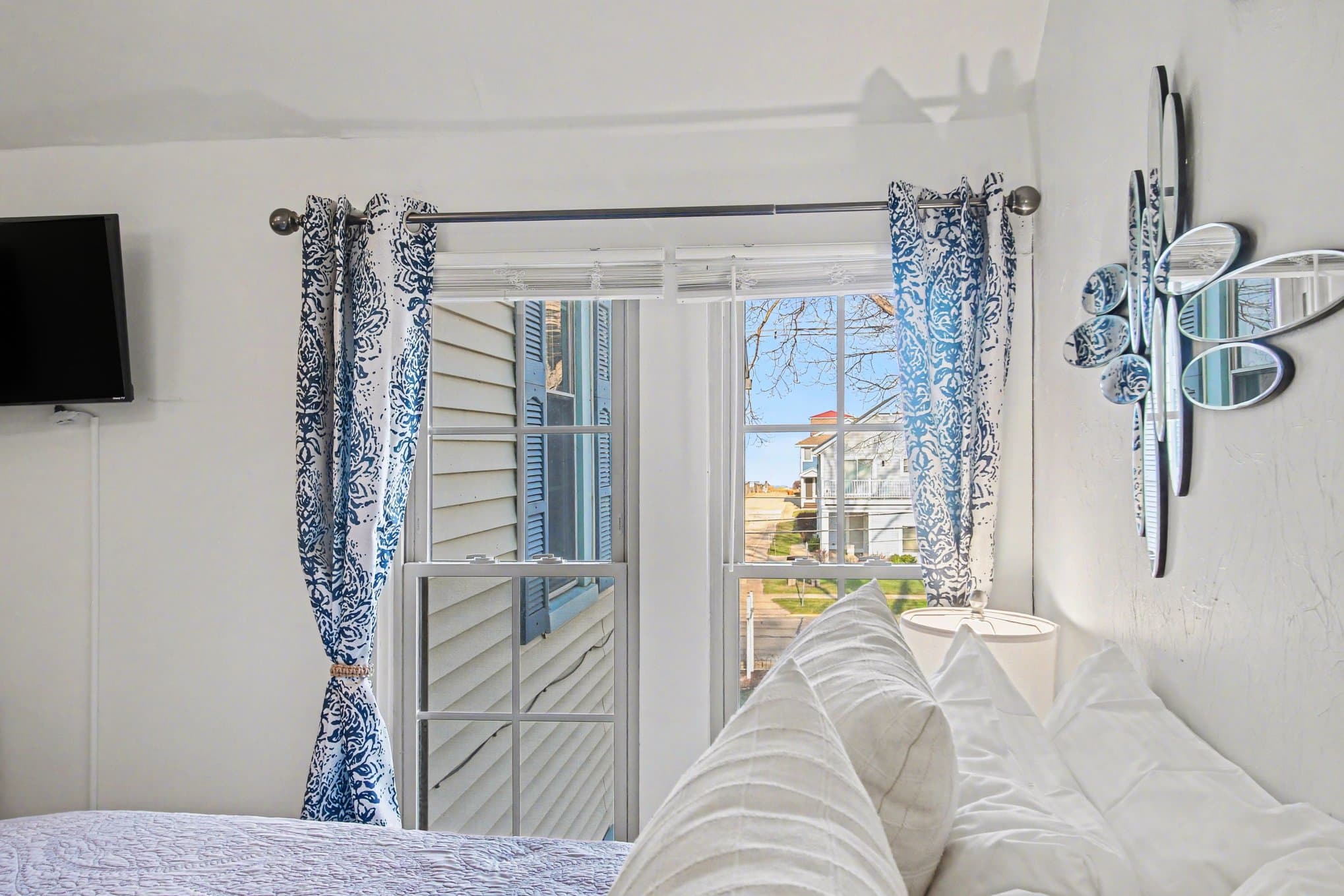 view from king bed overlooking the lake