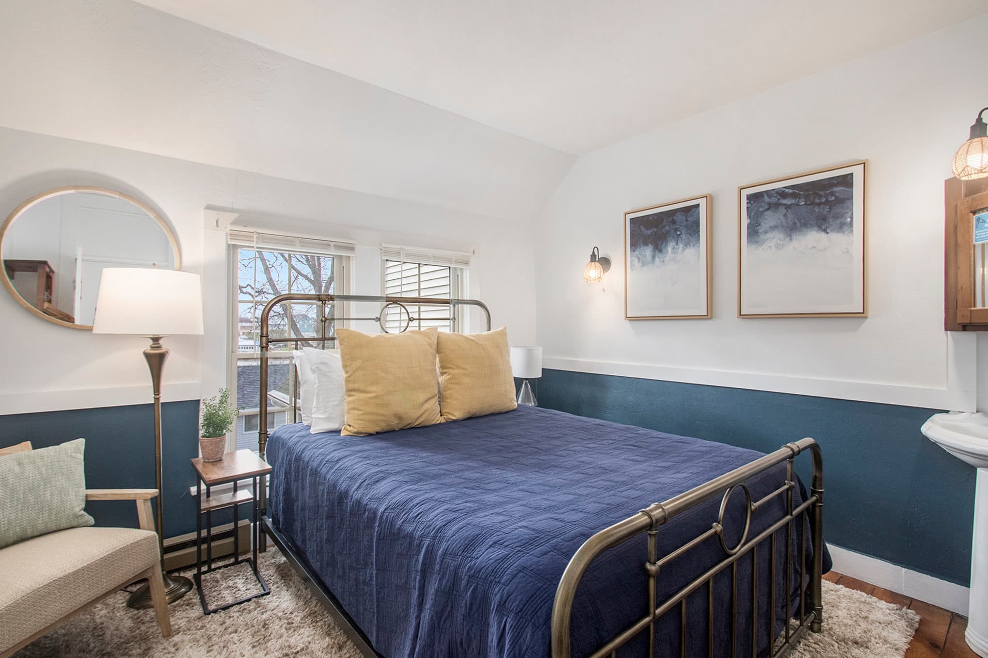 Queen bed and hardwood floors