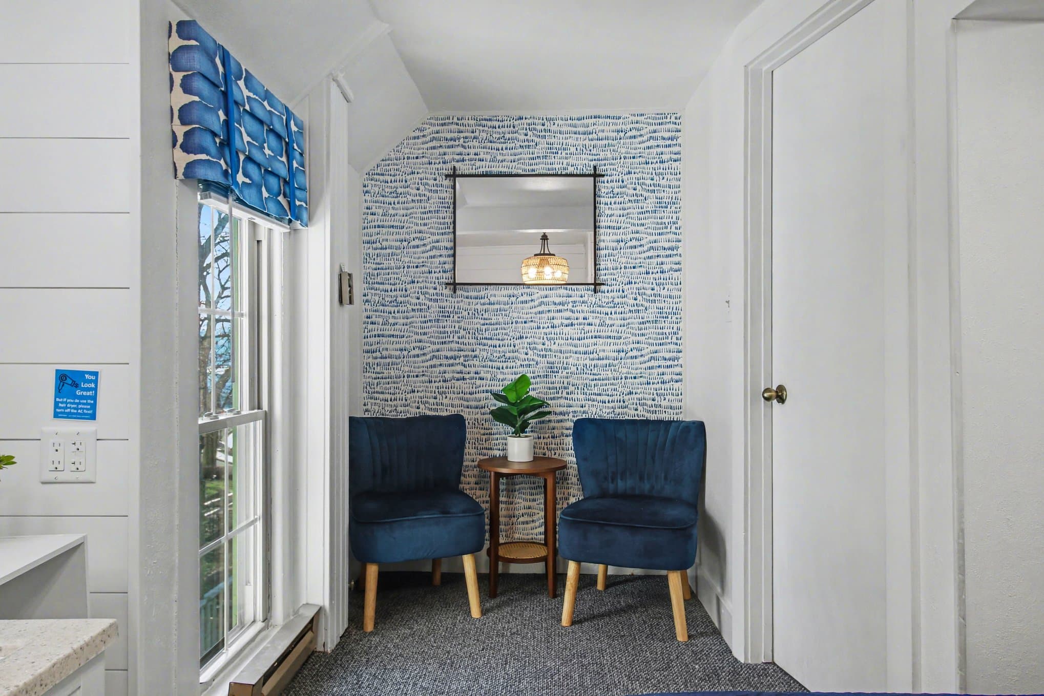 queen bed, vanity and shower