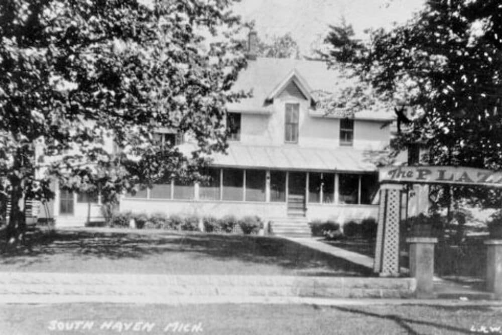Black and white photograph of a large house with a porch, identified as "The Plaza" in South Haven, Michigan.