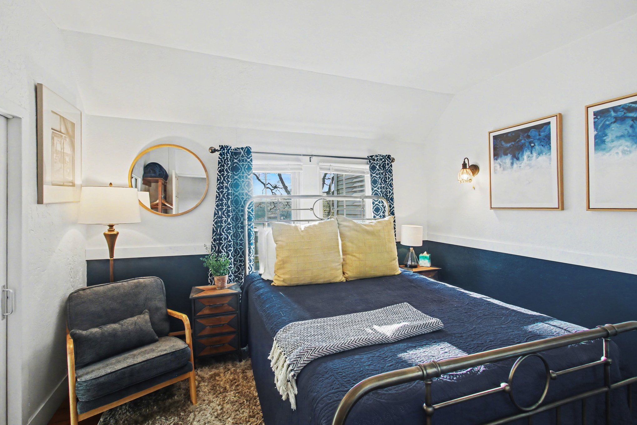 Queen bed and hardwood floors